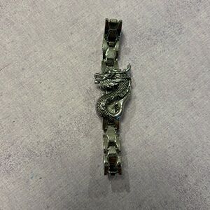 stainless steel dragon bracelet (lighting makes it look warm toned)